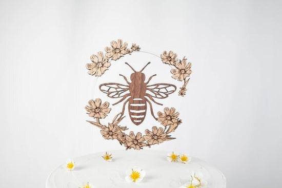 Load image into Gallery viewer, Bee Cake Topper with Flowers, birthday bee cake topper on a white cake.
